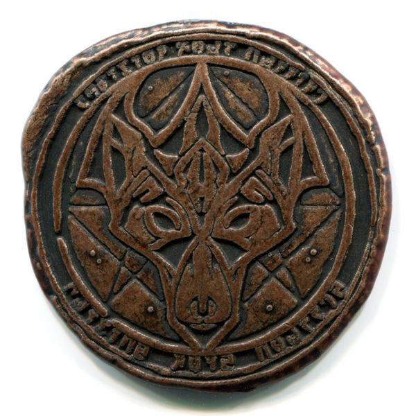 Файл:ON-prerelease-Gates of Oblivion Coin Wolf Face.jpg